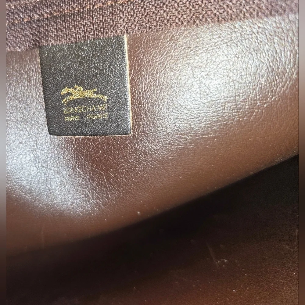 Longchamp Black and Gold Clutch